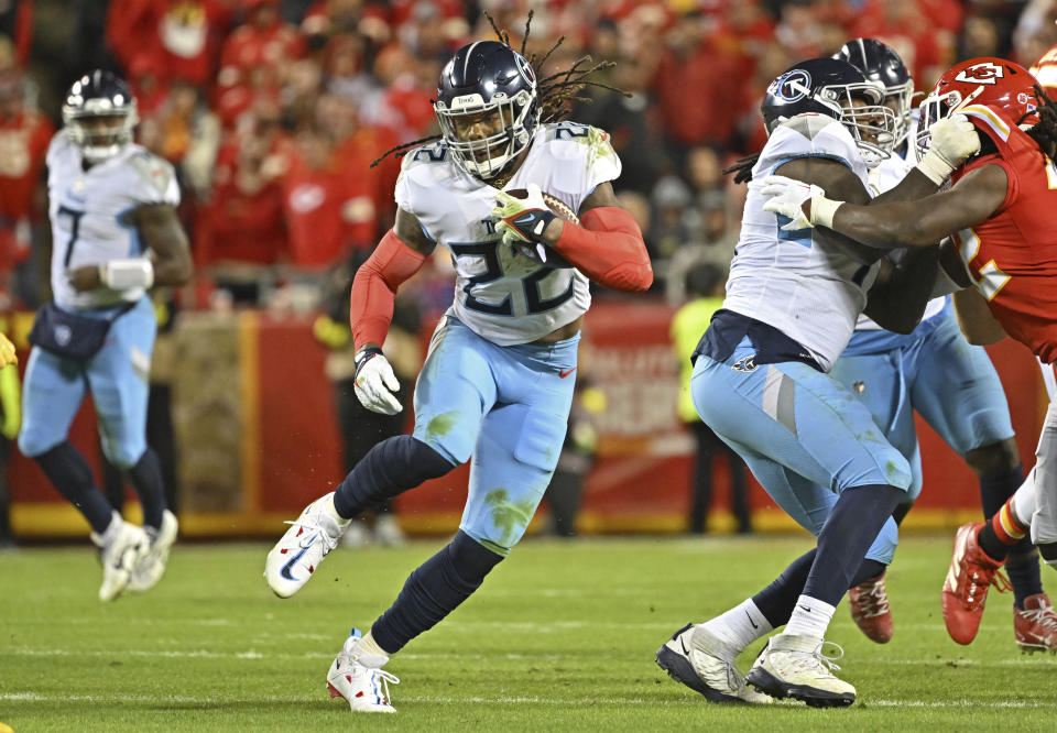 Tennessee Titans running back Derrick Henry (22) takes on the Packers on Thursday night. (AP Photo/Peter Aiken)