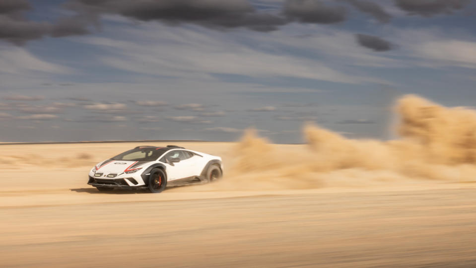 The Lamborghini Huracán Sterrato being driven in the dirt.