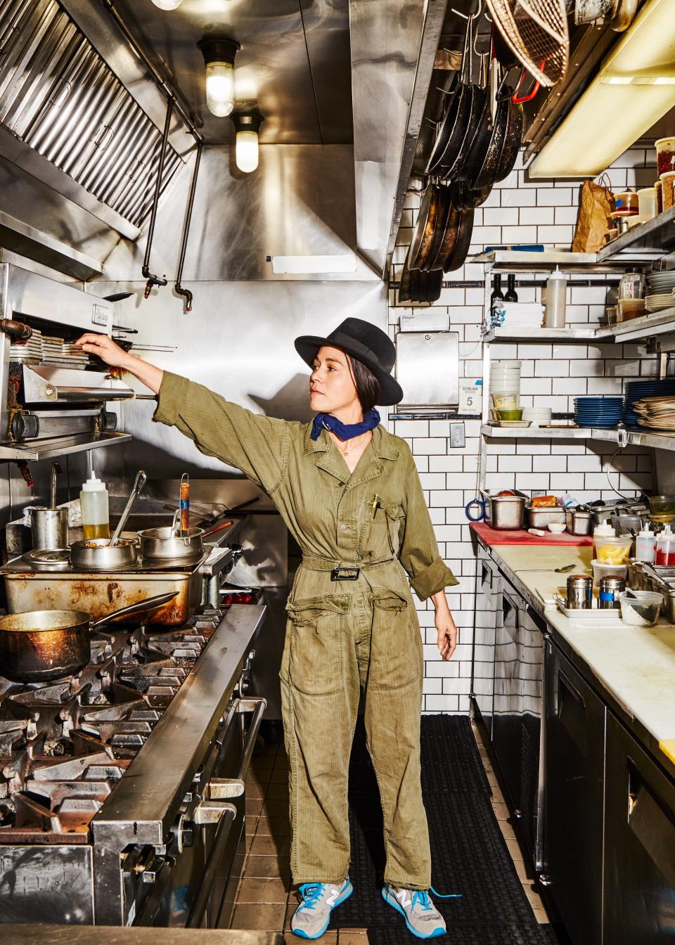 Chef Camille Becerra in the kitchen at De Maria.