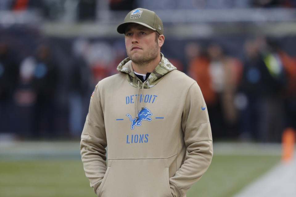 Thanks to fractures in his back, Detroit quarterback Matthew Stafford could only watch as the Lions lost to the Bears on Sunday. (AP/Charles Rex Arbogast)