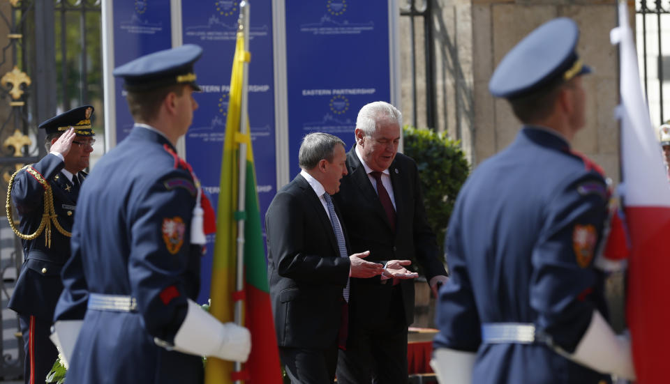 Acting Foreign Minister of Ukraine Andriy Deshchytisa, left, talks to Czech Republic's President Milos Zeman, right, upon his arrival for a meeting on the 5th anniversary of the Eastern Partnership at the Prague Castle in Prague, Czech Republic, Thursday, April 24, 2014. (AP Photo/Petr David Josek)