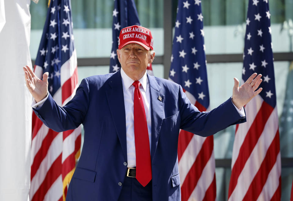 FILE - Republican presidential candidate former President Donald Trump enters at a campaign event, June 18, 2024, in Racine, Wis. Manhattan prosecutors are urging the judge overseeing Donald Trump’s criminal hush money case to uphold a gag order that bars the Republican former president from criticizing jurors, court staff, or members of the prosecution that convicted him. In court papers filed Friday, prosecutors with the Manhattan district attorney’s office argued portions of the gag order remained necessary given Trump’s “singular history of inflammatory and threatening public statements." (AP Photo/Jeffrey Phelps, File)