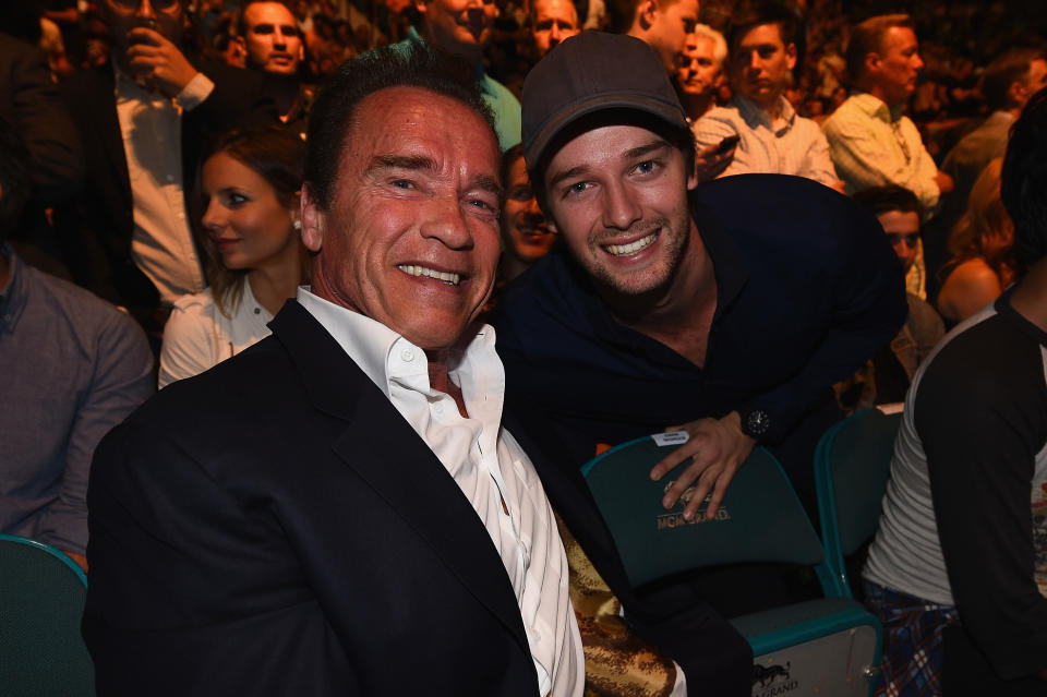 LAS VEGAS, NV - MAY 23:  (L-R) Arnold and Patrick Schwarzenegger in attendance during the UFC 187 event at the MGM Grand Garden Arena on May 23, 2015 in Las Vegas, Nevada.  (Photo by Jeff Bottari/Zuffa LLC/Zuffa LLC via Getty Images)