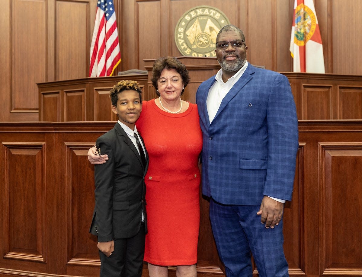 Big Brother Carlos Bates, right, and Little Brother Mihretu join Sen. Kathleen C. Passidomo, president of the Florida Senate, for "A Day in the Legislature." Bates has been named Big Brothers Big Sisters Association of Florida 2023 "Big of the Year."