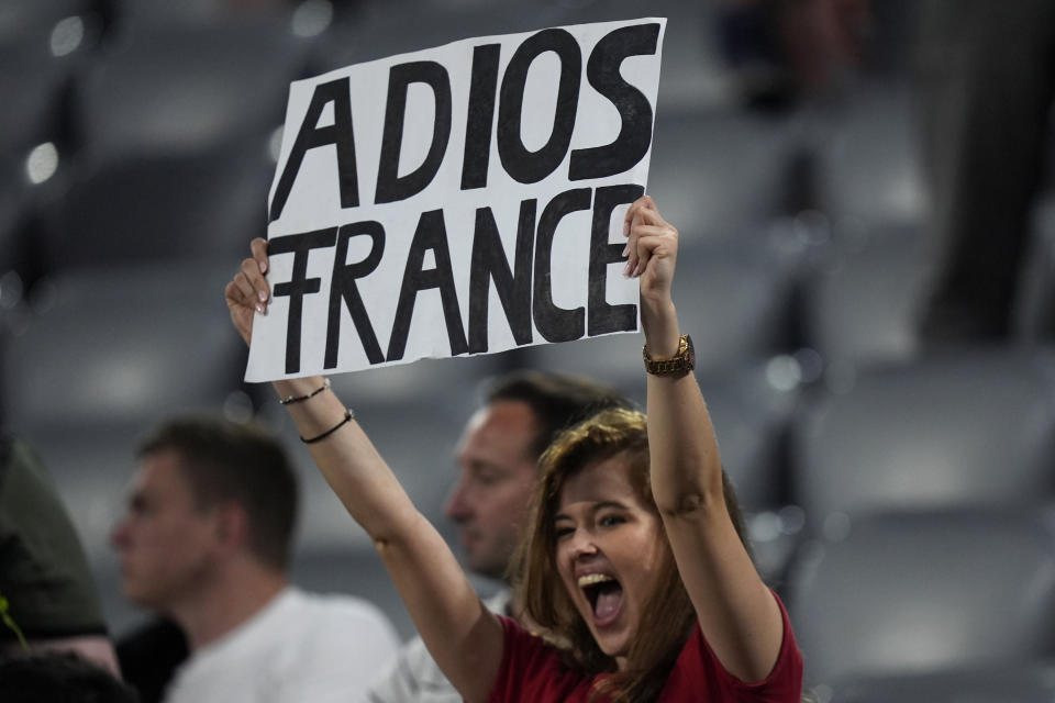 A Spain supporter holds up a poster on the stands at the end of a semifinal match between Spain and France at the Euro 2024 soccer tournament in Munich, Germany, Tuesday, July 9, 2024. Spain won 2-1. (AP Photo/Matthias Schrader)