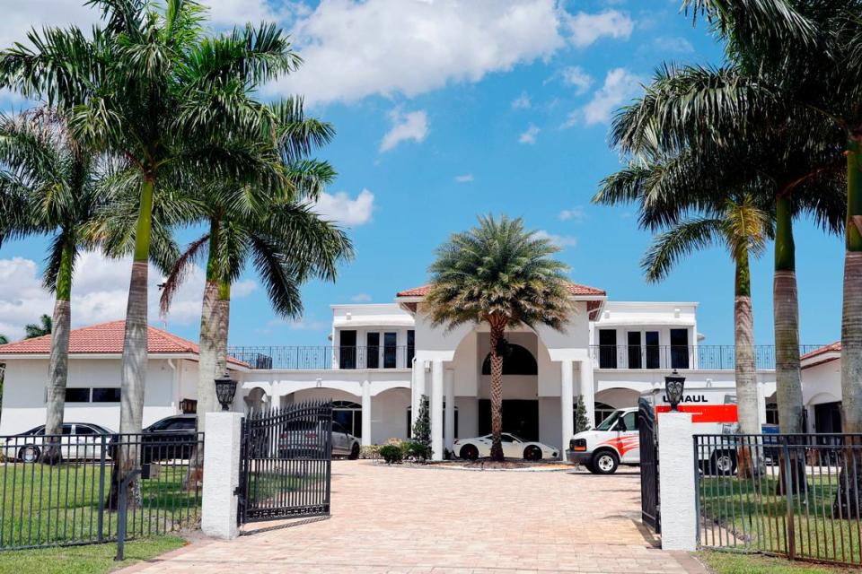 Sean Kingston’s Southwest Ranches home is shown during a raid by the Broward Sheriff’s Office on Thursday, May 23, 2024. A woman named Janice Turner, 61, was arrested on “numerous fraud and theft charges,” during the raid at the sprawling white mansion in the 4600 block of Southwest 178th Avenue, spokesperson Carey Codd said in a media release. Turner is Kingston’s mother, according to reports. (Amy Beth Bennett / South Florida Sun Sentinel)
