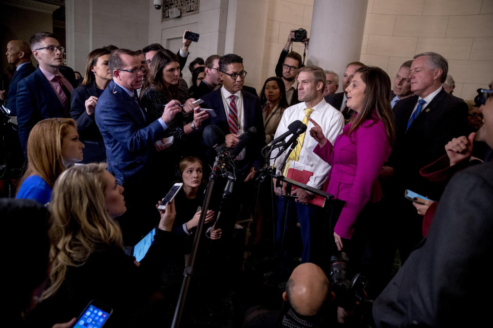 Rep. Elise Stefanik, R-N.Y., second from right, accompanied by Rep. Jim Jordan, R-Ohio, third from right, Rep. Mark Meadows, R-N.C., right, and other Republican lawmakers, speaks to members of the media following testimony from former U.S. Ambassador to Ukraine Marie Yovanovitch before the House Intelligence Committee on Capitol Hill in Washington, Friday, Nov. 15, 2019, during the second public impeachment hearing of President Donald Trump's efforts to tie U.S. aid for Ukraine to investigations of his political opponents. (Photo: Andrew Harnik/AP)
