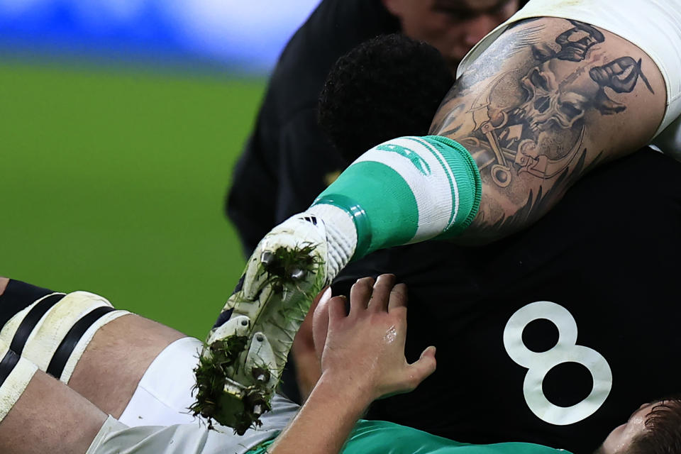 Ireland's Andrew Porter, top right, challenges for the ball during the Rugby World Cup quarterfinal match between Ireland and New Zealand at the Stade de France in Saint-Denis, near Paris, Saturday, Oct. 14, 2023. (AP Photo/Aurelien Morissard)