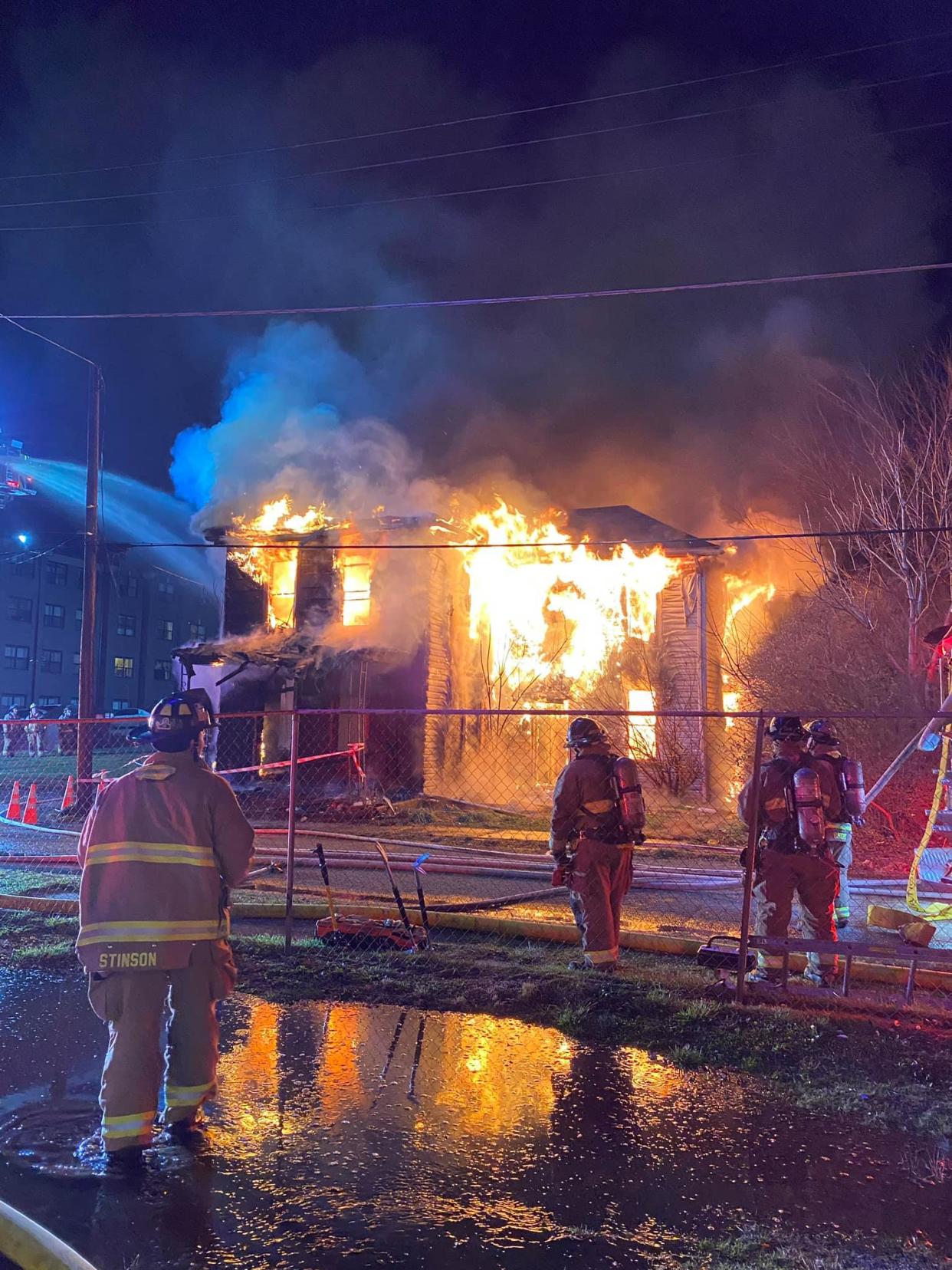 Canton firefighters battle a possible arson in 2020 in the 700 block of Rex Avenue NE.