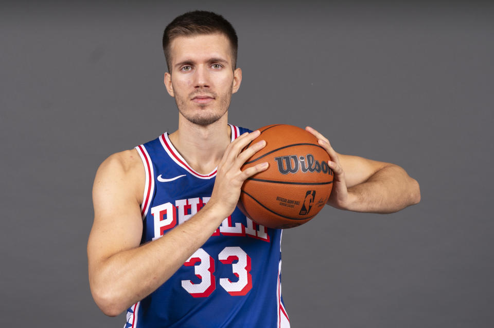 FILE - Philadelphia 76ers' Filip Petrusev poses for a photograph during media day at the NBA basketball team's practice facility, Monday, Oct. 2, 2023, in Camden. James Harden got his trade to the Clippers. The Sixers sent Harden, P.J. Tucker and Filip Petrušev to Los Angeles for Marcus Morris, Robert Covington, Nic Batum, K.J. Martin, a 2028 unprotected first-round pick, two second-round picks, a 2029 draft-pick swap and additional first-rounder from a third team, a person familiar with the trade told The Associated Press Tuesday, Oct. 31.(AP Photo/Chris Szagola, File)