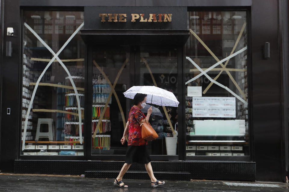 Windows of a store are taped up in preparation for Typhoon Bavi in Seoul, South Korea, Thursday, Aug. 27, 2020. Typhoon Bavi that grazed South Korea and caused some damage has made landfall in North Korea early Thursday. South Korean authorities said there were no immediate reports of casualties, and North Korea has not reported any damages. (AP Photo/Ahn Young-joon)