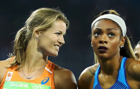 2016 Rio Olympics - Athletics - Semifinal - Women's 200m Semifinals - Olympic Stadium - Rio de Janeiro, Brazil - 16/08/2016. Dafne Schippers (NED) of Netherlands and Deajah Stevens (USA) of USA. REUTERS/Lucy Nicholson