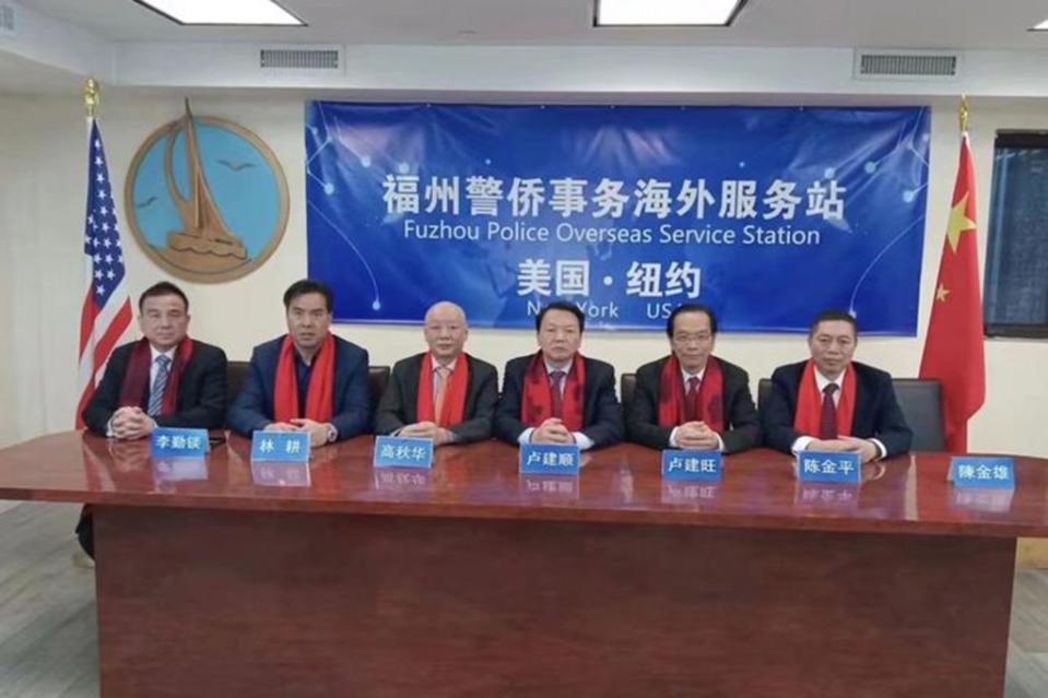 Members of the Fuzhou Police Overseas Service Station in New York sport CCP red scarves. The group operates a clandestine Chinese police station in Lower Manhattan.
