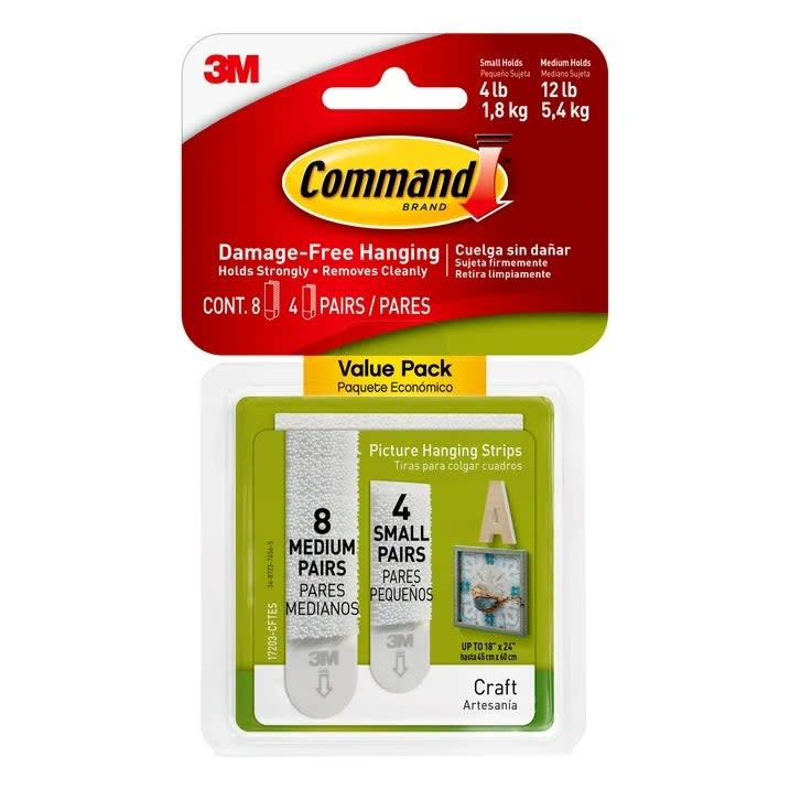 Package of 3M Command picture hanging strips with sizes and quantities visible