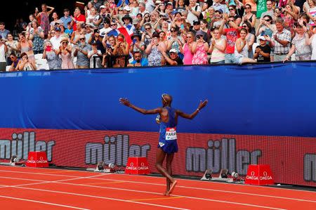 Britain Athletics - 2016 London Anniversary Games - Queen Elizabeth Olympic Park, Stratford, London - 23/7/16 Great Britain's Mo Farah celebrates winning the men's 5000m Reuters / Eddie Keogh Livepic