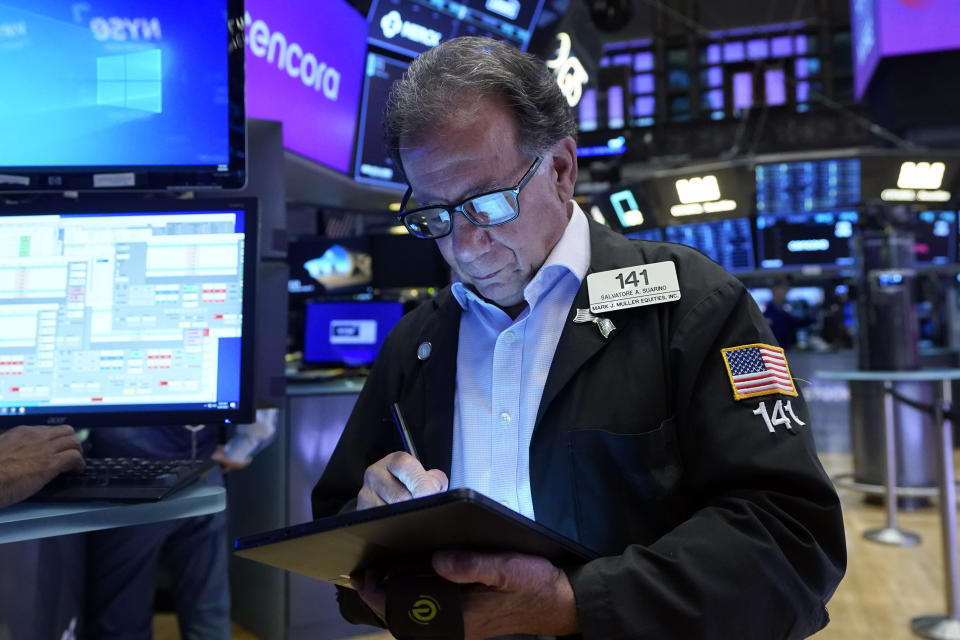 Trader Sal Suarino works on the floor of the New York Stock Exchange, Wednesday, Aug. 30, 2023. Stocks are edging mostly higher in early trading on Wall Street chipping a bit more away from the market's losses in August. (AP Photo/Richard Drew)
