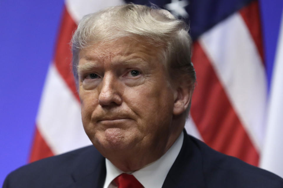 President Donald Trump listens as he meets with Italian Prime Minister Giuseppe Conte during the NATO summit at The Grove, Wednesday, Dec. 4, 2019, in Watford, England. (AP Photo/ Evan Vucci)