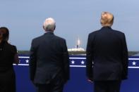 U.S. President Donald Trump, U.S. Vice President Mike Pence and his wife Karen Pence watch the launch of a SpaceX Falcon 9 rocket and Crew Dragon spacecraft, from Cape Canaveral