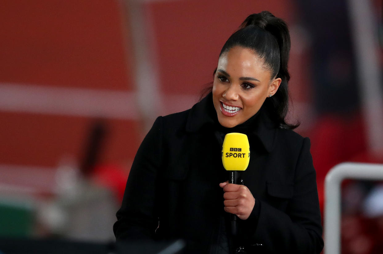BBC TV Presenter and former football player Alex Scott is seen working in the stands during the International Friendly match between England and Canada at Bet365 Stadium on April 13, 2021 in Stoke on Trent, England. Sporting stadiums around the UK remain under strict restrictions due to the Coronavirus Pandemic as Government social distancing laws prohibit fans inside venues resulting in games being played behind closed doors. (Photo by Catherine Ivill/Getty Images)