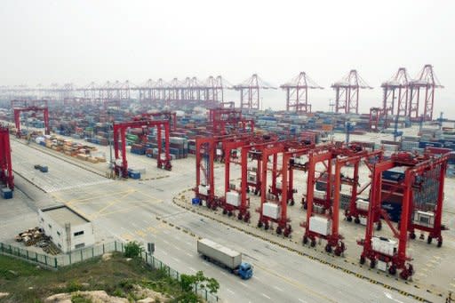 This file photo shows the deep-sea port of Shanghai. China swung into a huge trade deficit of $31.48 billion in February, according to the latest customs data, as the West's economic troubles hit the world's second-largest economy