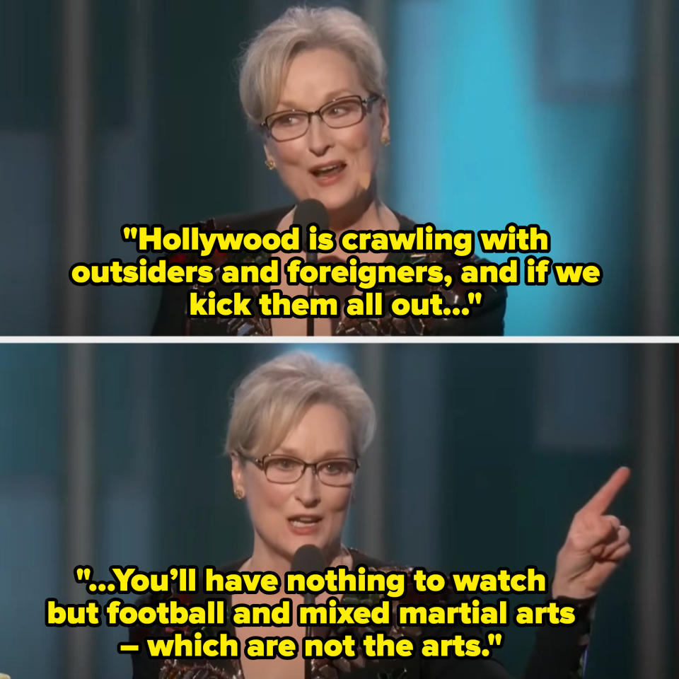 Meryl Streep speaking at a podium in a patterned dress, gesturing with her right hand