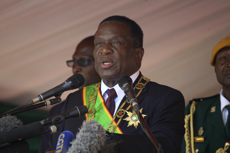 Zimbabwean President Emmerson Mnangagwa addresses people during a Heroes' Day holiday event to commemorate the lives of those who died in the southern African country's 1970s war against white minority rule, in Harare, Monday, Aug. 13, 2018. Zimbabwe's president has called on the troubled country to unite and "put the election period behind us and embrace the future" in his first public address since winning disputed elections. (AP Photo/Tsvangirayi Mukwazhi)