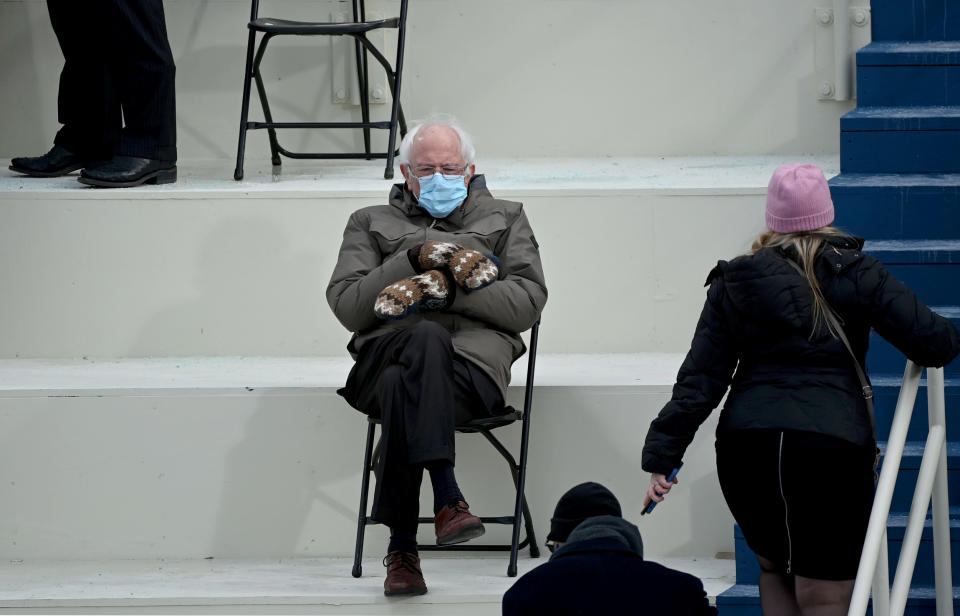 Image: Sen. Bernie Sanders sits in the bleachers at the Capitol before the inauguration on Jan. 20, 2021. (Brendan Smialowski / AFP - Getty Images file)