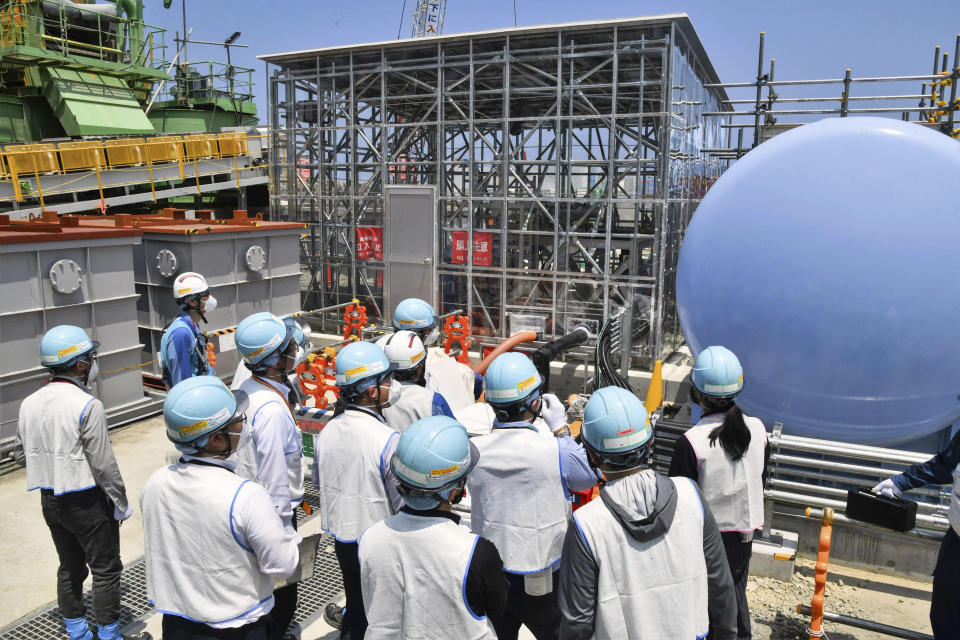 An equipment to be used to dilute the water with seawater is shown to media at the Fukushima Daiichi nuclear power plant in Fukushima, northern Japan, Monday, June 26, 2023. All equipment needed for the release into the sea of treated radioactive wastewater from the wrecked Fukushima nuclear plant has been completed and will be ready for a safety inspection by Japanese regulators this week, the plant operator Tokyo Electric Power Company Holdings said Monday, as opposition to the plan continues in and outside Japan over safety concerns.(Kyodo News via AP)