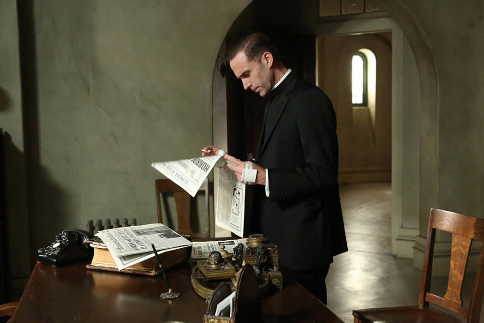 Joseph Fiennes as Monsignor Timothy Howard in the "American Horror Story: Asylum" episode, "Spilt Milk."