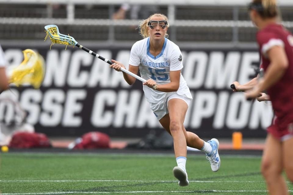 May 28, 2021; Towson, Maryland, USA;   Scottie Rose Growney #15 of the North Carolina runs with the ball in the fist half during a semi final NCAA Women’s Lacrosse Championship against the Boston College at Johnny Unitas Stadium. Mandatory Credit: Mitchell Layton-USA TODAY Sports