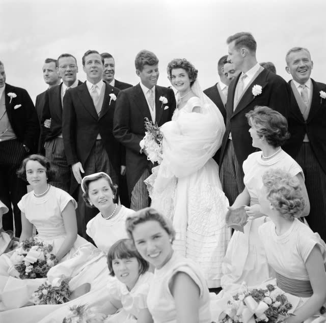 Wedding of Jackie Bouvier Kennedy and John F. Kennedy, Sept. 23, 1953. Among those in the wedding party are Lee Bouvier Canfield (far left), and Ethel Shriver Kennedy (center front), and Jean Kennedy (face turned to the couple) 
