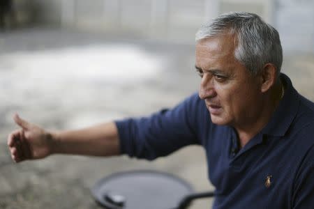 Guatemala's former President Otto Perez speaks during an interview with Reuters at the Matamoros Army Base where he is being held awaiting trial, in Guatemala City, October 24, 2015. REUTERS/Jorge Dan Lopez