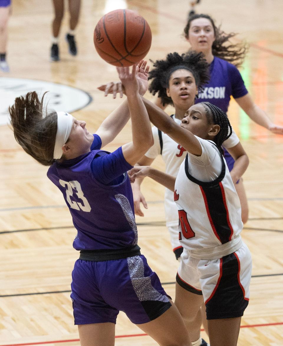 Jackson freshman Ashley Helle attempts a shot against McKinley.