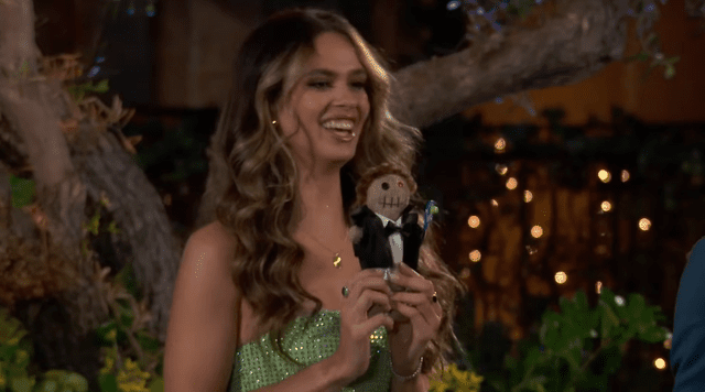 <p>ABC</p> Kelsey presents Joey with a voodoo doll on 'The Bachelor'