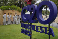 Hotel staff prepare a venue for a side event of the G20 Foreign Ministers' Meeting in Nusa Dua, Bali, Indonesia, Thursday, July 7, 2022. Foreign ministers from the Group of 20 leading rich and developing nations are gathering in Indonesia's resort island of Bali for talks bound to be dominated by the conflict in Ukraine despite an agenda focused on global cooperation and food and energy security. (AP Photo/Dita Alangkara)