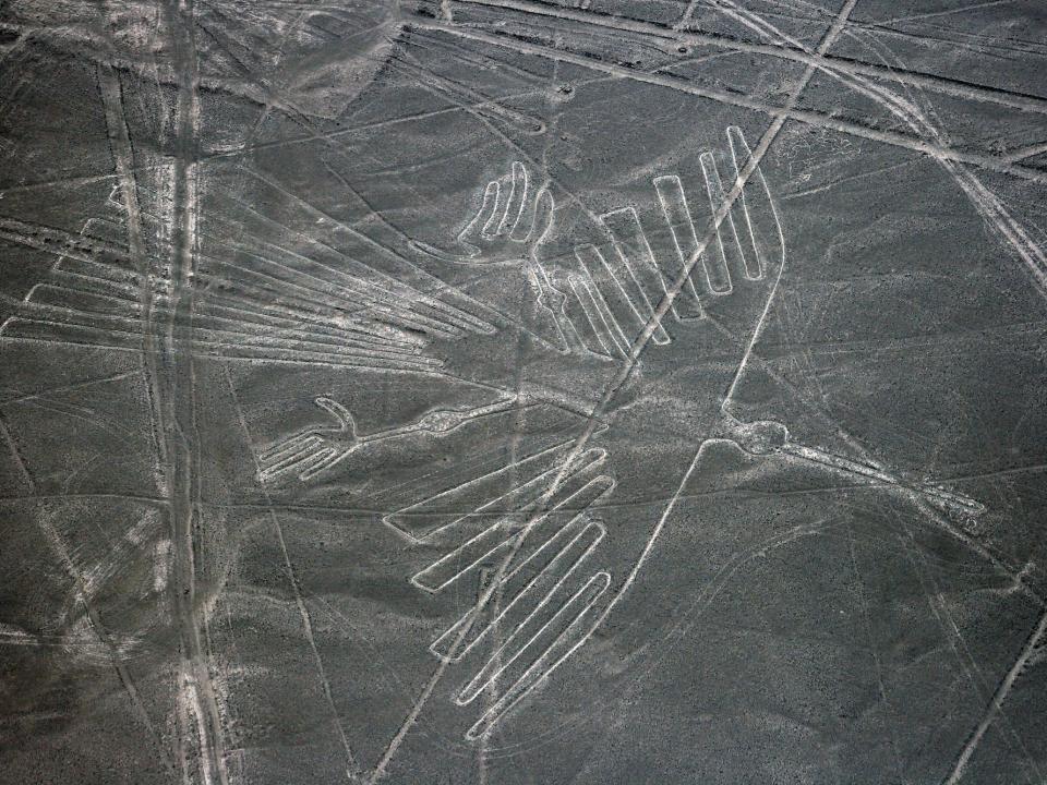 An aerial photo shows the shape of a condor drawn into the Atacama desert.