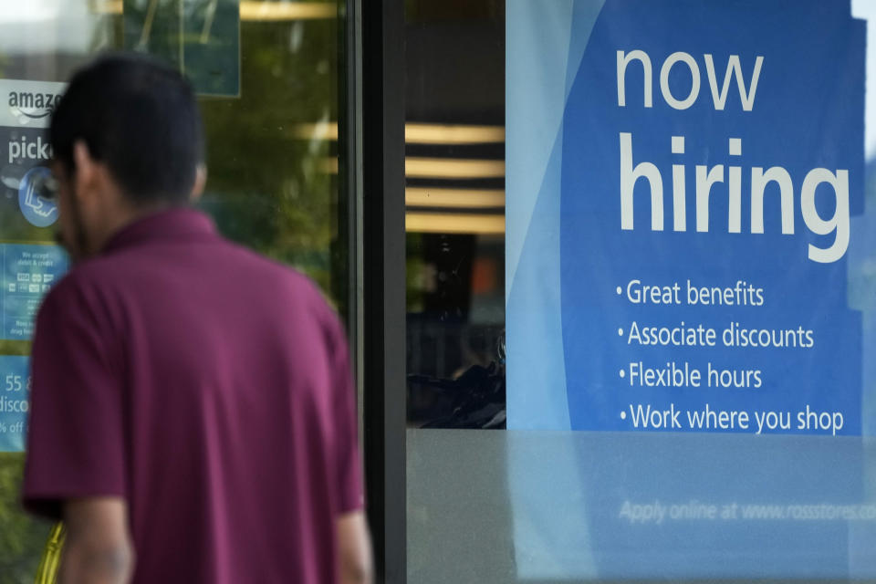 CORRECTS MONTH HIRING DECELERATED FROM JUNE TO JULY - FILE - A hiring sign is displayed at a retail store in Schaumburg, Ill., July 10, 2024. U.S. hiring decelerated sharply in July in the face of high interest rates as employers added a weak 114,000 jobs. (AP Photo/Nam Y. Huh, File)