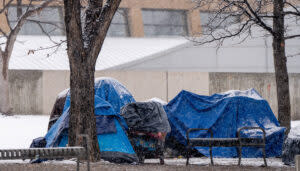 People experiencing homelessness camp outside in Salt Lake City.