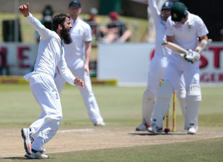 England's Moeen Ali (left) dismissed South African opener Dean Elgar on the opening day of the third Test on January 14, 2016