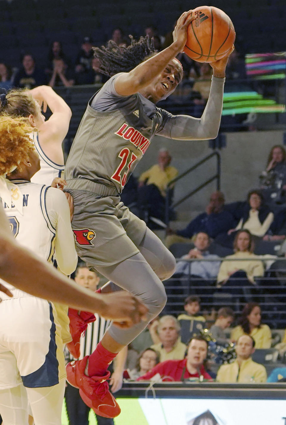 Louisville guard Jazmine Jones shoots around Georgia Tech defense during the second half of an NCAA college basketball game Thursday, Feb. 20, 2020, in Atlanta, Ga. (AP Photo/Tami Chappell)