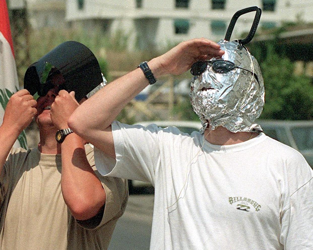1999: Eclipse watchers in Beirut find novel means of protecting ther eyesight while viewing the last total solar eclipse of the 20th century.