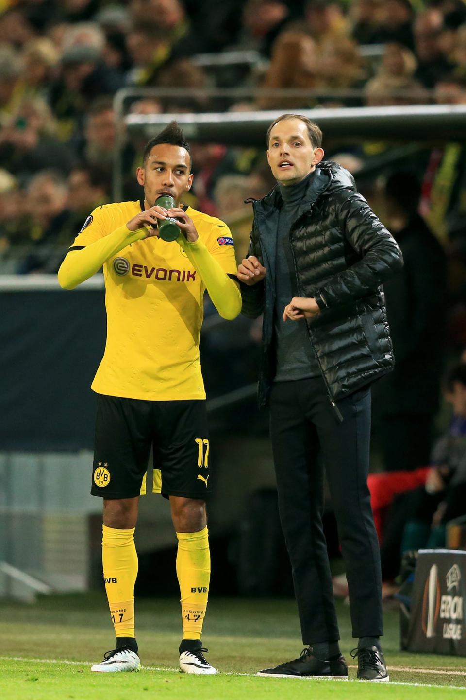 Barcelona are thought to be ready to negotiate over Pierre-Emerick Aubameyang, left, who could reunite with Thomas Tuchel, right (Adam Davy/PA) (PA Archive)