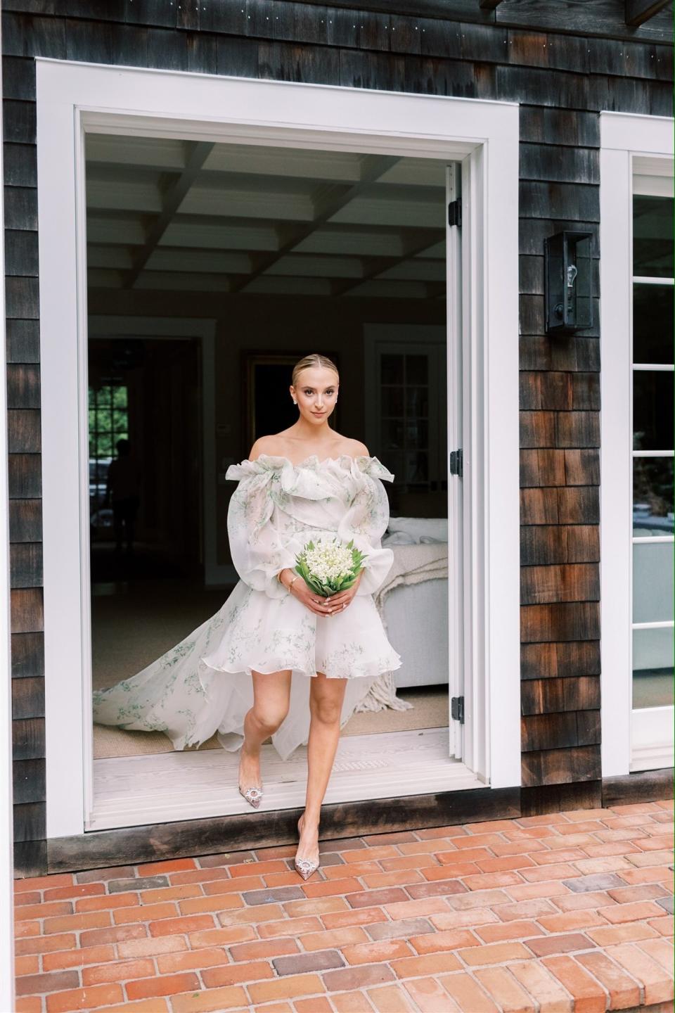 The Bride and Groom Said Their Vows Beneath a Floral Chuppah at This Hamptons Backyard Wedding