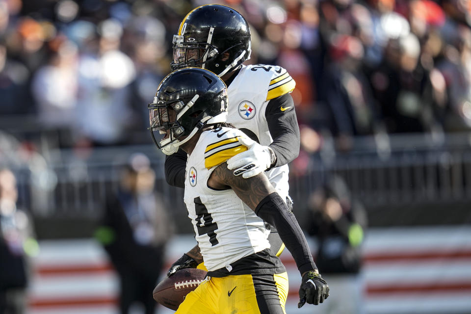 Pittsburgh Steelers cornerback Chandon Sullivan (34) celebrates his interception off Cleveland Browns wide receiver Cedric Tillman during the second half of an NFL football game, Sunday, Nov. 19, 2023, in Cleveland. (AP Photo/Sue Ogrocki)