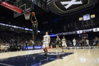 Providence guard Al Durham (1) scores a basket during the first half of an NCAA college basketball game against Xavier, Wednesday, Jan. 26, 2022, in Cincinnati. (AP Photo/Jeff Dean)