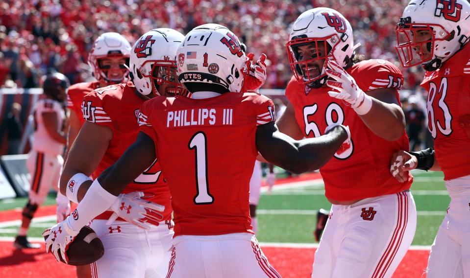 Utah Utes cornerback Clark Phillips III celebrates a pick-six with teammates as Utah and Oregon State play at Rice-Eccles Stadium in Salt Lake City on Saturday, Oct. 1, 2022. | Morgan V. Winterton, Deseret News