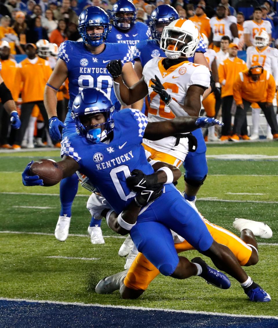 Kentucky’s Kavosiey Smoke scores a touchdown against Tennessee.Nov. 6, 2012