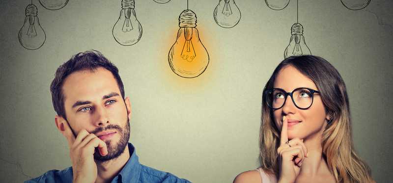 Young man and woman thinking with images of lightbulbs in the background.