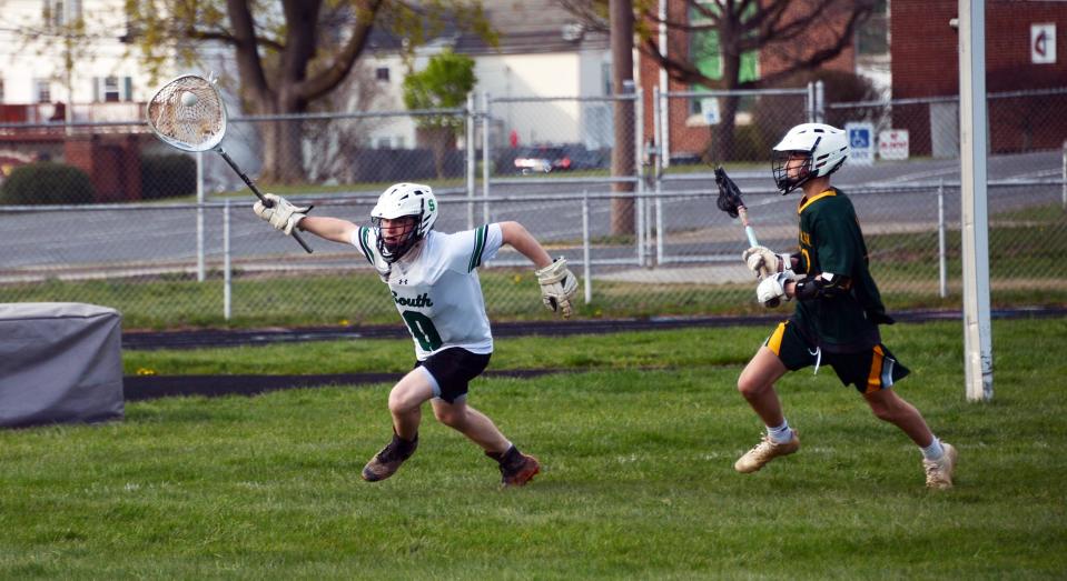 South Hagerstown goalie Joseph Fox runs with possession after winning a ground ball behind the net against Sandy Spring Friends. Fox made 26 saves in a 9-7 loss.