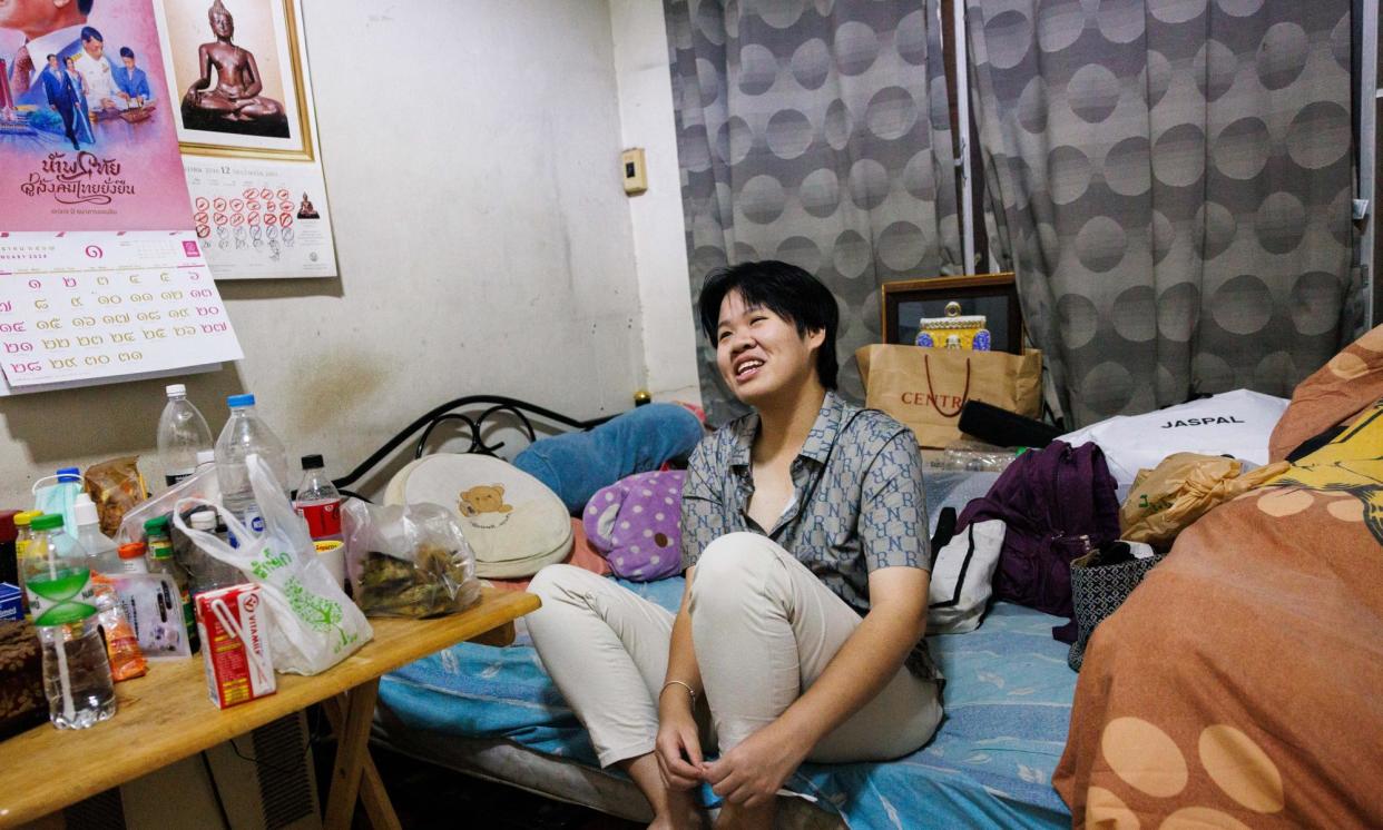 <span>Titapa Thaipreecha, 24, says living in Bangkok, Thailand can be difficult if ‘you don’t have a lot of money’.</span><span>Photograph: Lauren DeCicca/The Guardian</span>